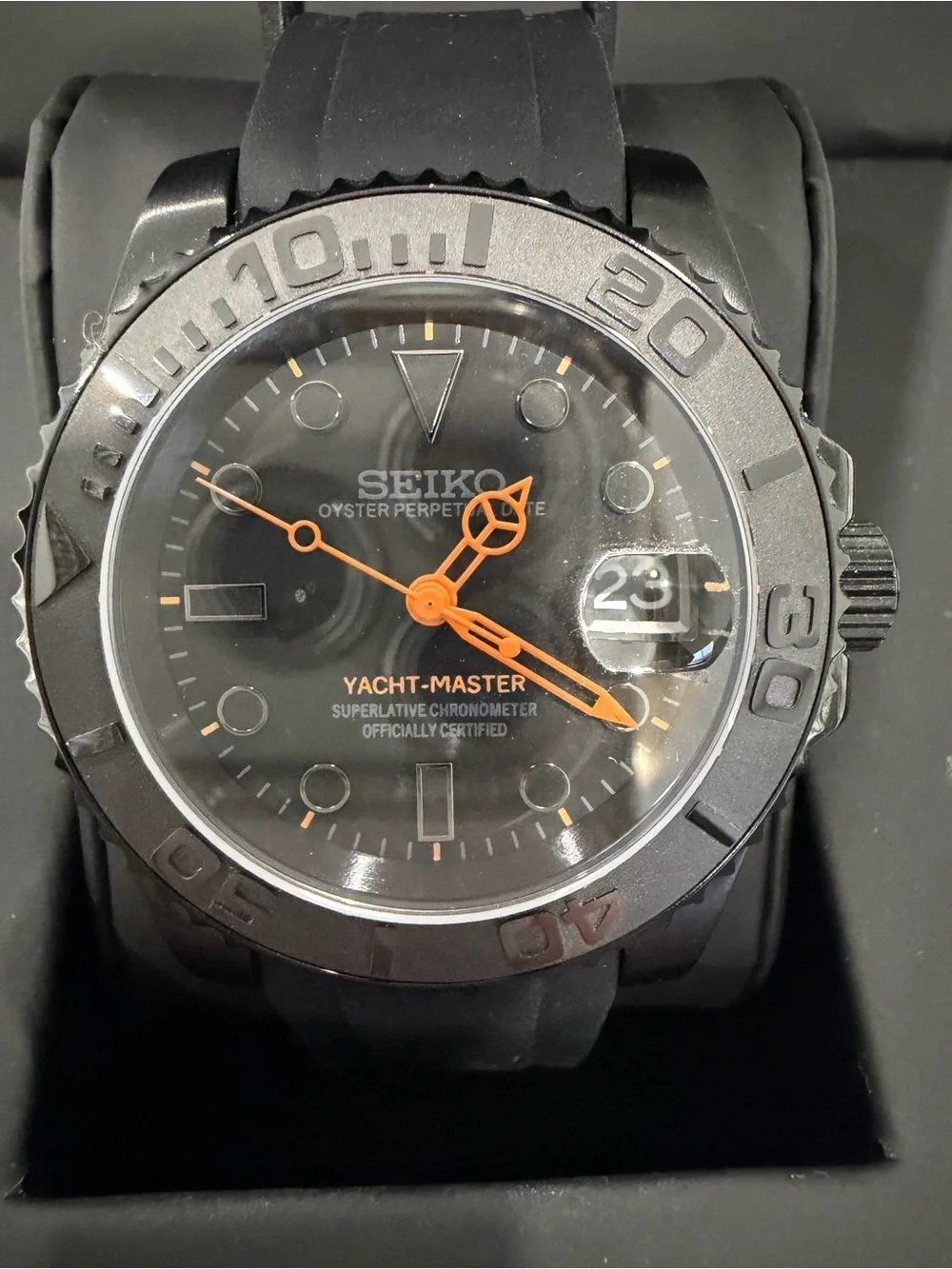 Seiko Men's Black Watch with Orange Hands and Markers